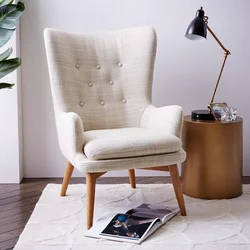 Armchair in the interior of a small bedroom