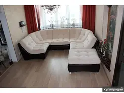 Corner sofa in the living room with an armchair photo