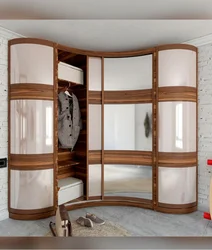 Photo of corner cabinets in the living room with a mirror