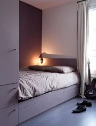 Bedroom design with bed along the wall