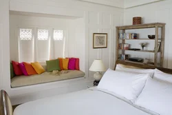 Bedroom Design With Bed Along The Wall