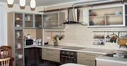 Corner kitchen with railing photo