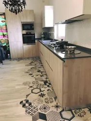 Brown Tiles On The Floor In The Kitchen Interior