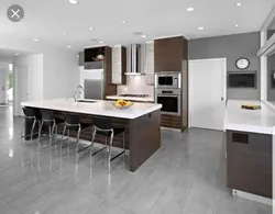 Brown Tiles On The Floor In The Kitchen Interior