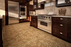 Brown tiles on the floor in the kitchen interior