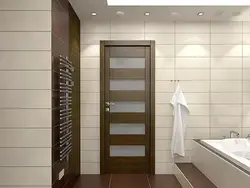 Bathroom design with dark door