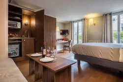 Hotel room design with kitchen