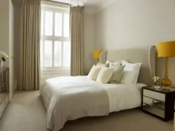 Beige Bed In The Bedroom Interior