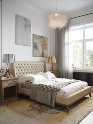 Beige bed in the bedroom interior