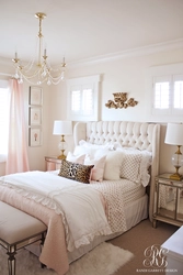 Cream bed in the bedroom interior