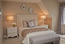 Cream bed in the bedroom interior