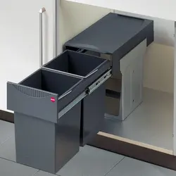 Trash can in the kitchen interior