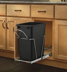 Trash can in the kitchen interior