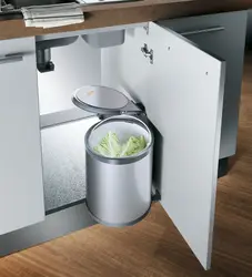 Trash can in the kitchen interior