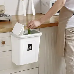 Trash can in the kitchen interior