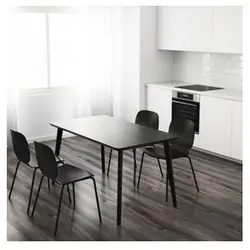 Black chairs for the kitchen in the interior