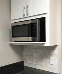 Microwave in the kitchen interior in the closet