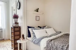 Bedroom interior with bed against the wall