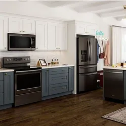 White kitchen black refrigerator photo