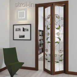 Accordion door to the kitchen photo