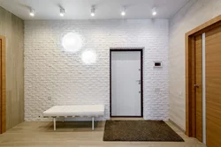 Hallway with white bricks photo