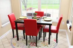 Kitchen interior with red chairs