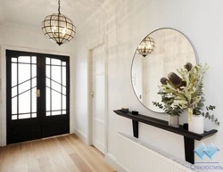 Round mirrors in the hallway interior photo