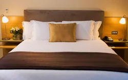 Photo of a large bed in the bedroom