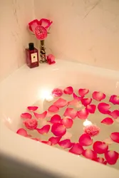 Photo in the bathroom with petals