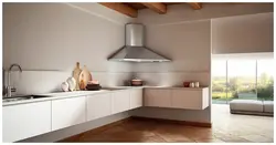 Photo of a kitchen with a corner hood