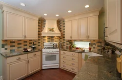 Photo of a kitchen with a corner hood