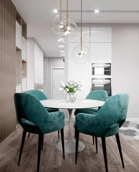 Photo of a kitchen with green chairs