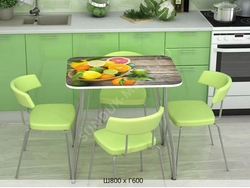 Photo Of A Kitchen With Green Chairs