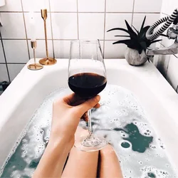 Photo with a glass in the bathroom