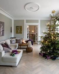 Photo of a living room with a Christmas tree