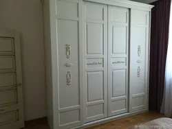 Шкаф в спальню из массива фото