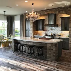 Photo of a kitchen made of wood and brick