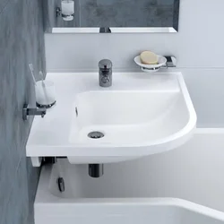 Bathtub with sink included photo