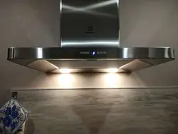 Built-in kitchen hood with ventilation outlet photo