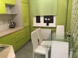 Kitchen interior with green refrigerator