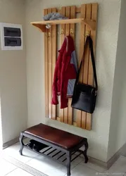 Hanger made of slats in the hallway photo