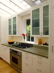 Stove by the window in the kitchen photo