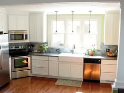 Stove by the window in the kitchen photo