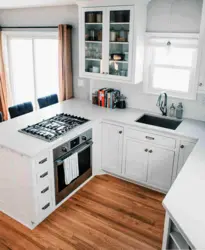 Stove by the window in the kitchen photo