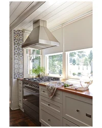 Stove by the window in the kitchen photo