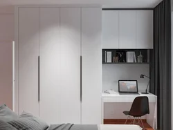 Photo of a bedroom closet up to the ceiling