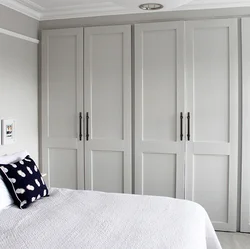 Photo of a bedroom closet up to the ceiling