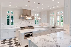 White kitchen with marble splashback photo