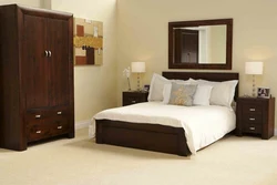 Brown bed in the bedroom interior photo