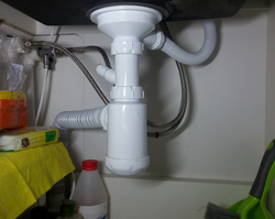 Pipe Under The Sink In The Kitchen Photo